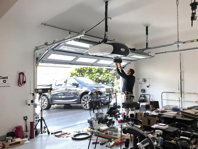 North Branford Garage Door Repair specialist installing smart garage door opener system in North Branford home