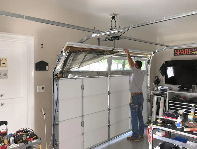 Garage door section replacement by North Branford Garage Door Repair in North Branford