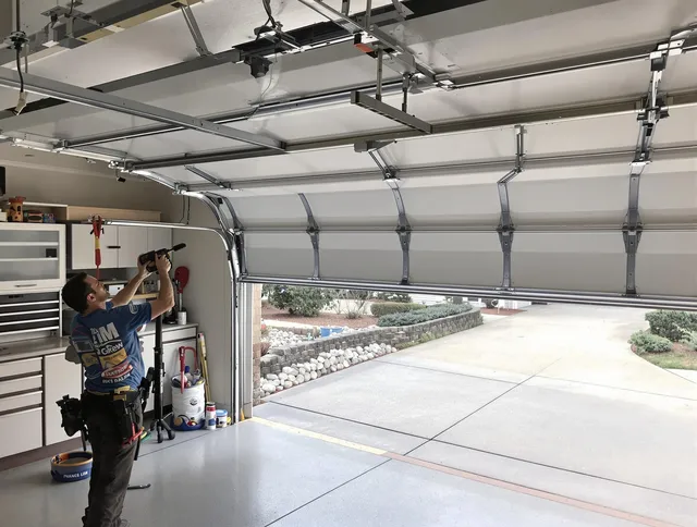 Garage door track repair service by North Branford Garage Door Repair in North Branford